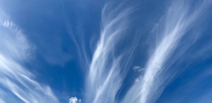 Flares of Clouds at blue sky. © A