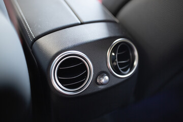 Fototapeta premium Luxury car rear seat row air conditioning control