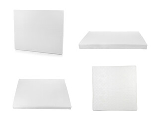Set with modern comfortable mattresses on white background