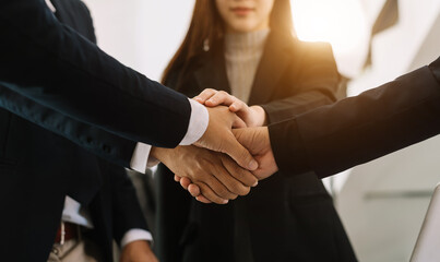 Close up on hands of business people join together their hands together on unity concept 