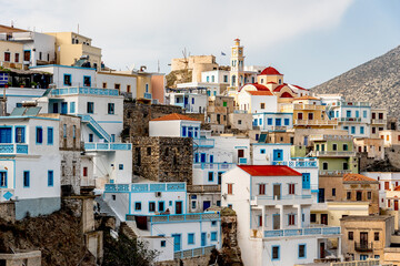 GREECE, KARPATHOS - OCTOBER 17, 2019 -Traditional  greek village of Olympos hidden in mountain range with typical houses