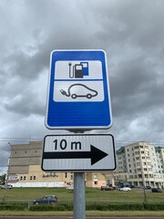 Road sign for electric vehicles charging station. Vilnius, Lithuania.