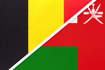 Belgium and Sultanate of Oman, symbol of two national flags from textile. Championship between two countries.