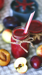 Selective focus. Macro. Plum apple smoothie. Homemade summer fruit smoothies. Detox food.