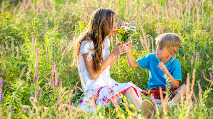 Obraz premium Enjoying life together , happy mother and son having fun together