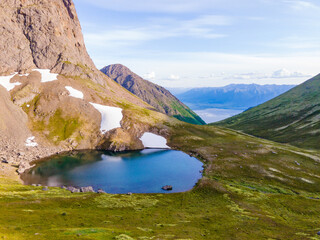 Naklejka premium Small alpine lake at the top of Falls Creek Trail, Anchorage Alaska