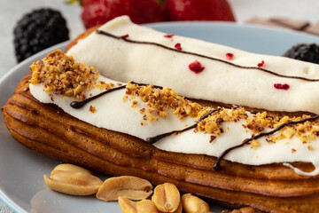 Close up photo of fresh french eclair cake with icing