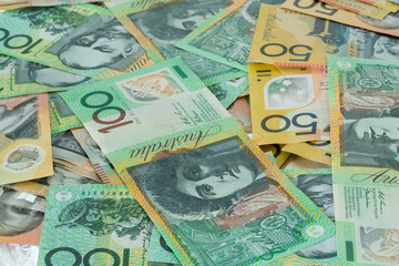 Close up of Australian $50 and $100 notes background