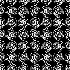 Seamless pattern from roses on a black background. Vector illustration of a seamless background of roses. Hand drawn roses.