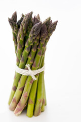 Heap of fresh asparagus isolated. Fresh vegetables. Top view.