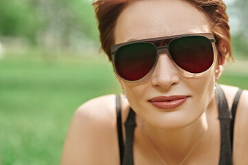 woman in modern sunglasses