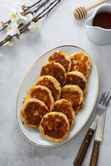 Cheese flapjacks or pancakes. Rounf frities made from cotage cheese.