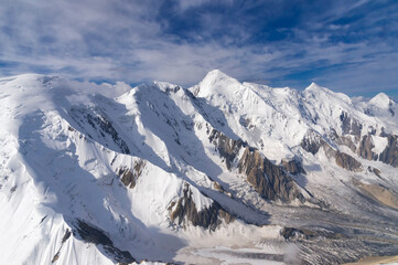 Fototapeta premium Aerial view over the Central Tian Shan Mountain range, Border of Kyrgyzstan and China, Kyrgyzstan