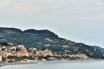 view of the town in greece, photo as a background , in Finale Ligure sea village north italy