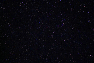 Space background on the desktop, screensaver. Night starry sky of the Northern hemisphere. Various cosmic bodies and constellations. The stars are like small bright lights.