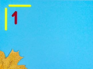 Maple leaf on a blue background. Layout on the theme of the school. First of September. Knowledge day. Back to school. Minimalism. Flat lay. copy space.