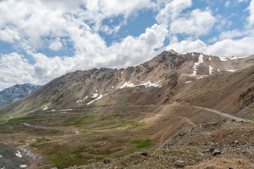 Fototapeta na wymiar Chong Ashuu pass at 3800 meters above sea level, Issyk Kul region, Kyrgyzstan