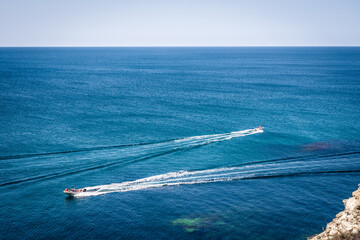 Naklejka premium amazing view to two yachts or boats and clear dark blue water summer paradise. Copy space