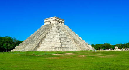 Fototapeta na wymiar Chichen Itza, Yucatan / Mexico - August 2018: El Castillo or the Temple of Kukulcan in Chichen Itza archaeological site, Yucatan, Mexico
