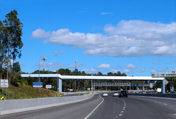 Overhead road toll scanners. Sydney city road / freeway. The M4 Motorway is a 50.2-kilometre-long dual carriageway partially tolled motorway in Sydney