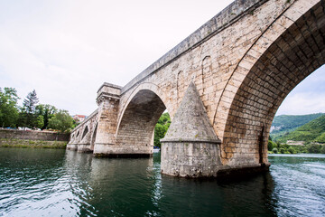 Historic bridge over the Drina River, Famous Tourist Attraction, The Mehmed Pasa Sokolovic Bridge in Visegrad, Bosnia and Herzegovina