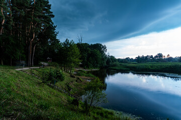 The evening before the storm on the river