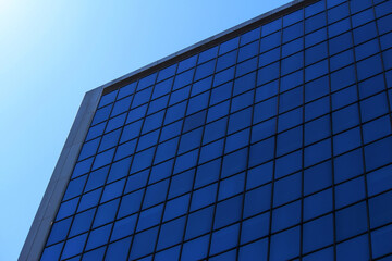 Abstract close up gridded glass office building.  
