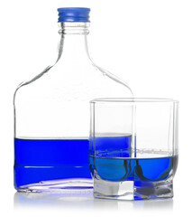 Bottle and glass with blue alcoholic beverage on white background isolation