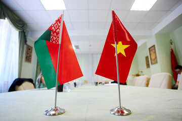 flags of belarus and china in business atmosphere