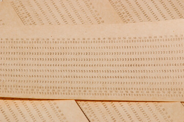 Background from computer punched cards. A lot of punched cards for old computers