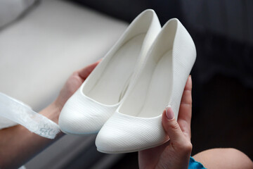 Wedding white shoes bride bride close-up.