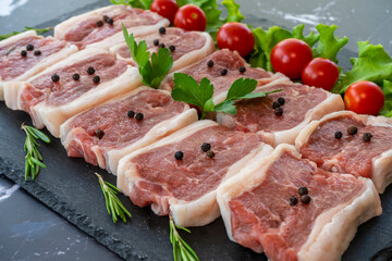 raw meat on a black background