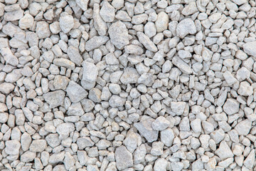 Stone gravel at a construction site as a background.