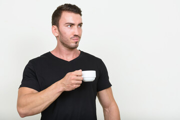 Portrait of handsome bearded man against white background