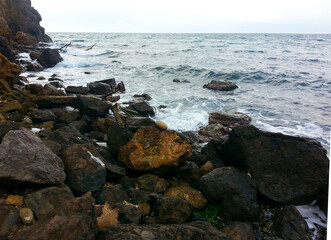Fototapeta na wymiar coast sea gravel rock photo background image