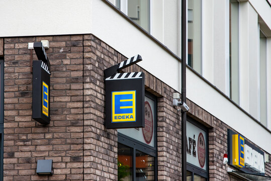 Edeka logo integrated in film flap on a facade in Brandenburg an der Havel, Germany