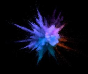 Abstract coloured powder explosion on black