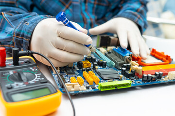 Technician repairing micro circuit main board computer electronic technology, hardware, mobile...