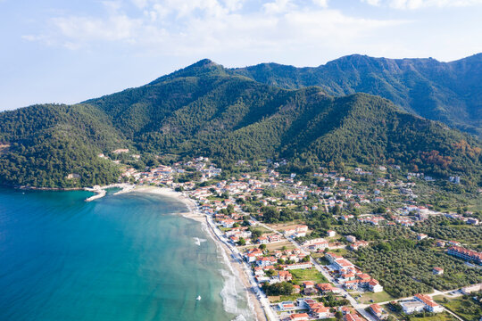  Aerial view of idyllic Golden beach toward the headland at Skala Potamia, Thassos, Greece
