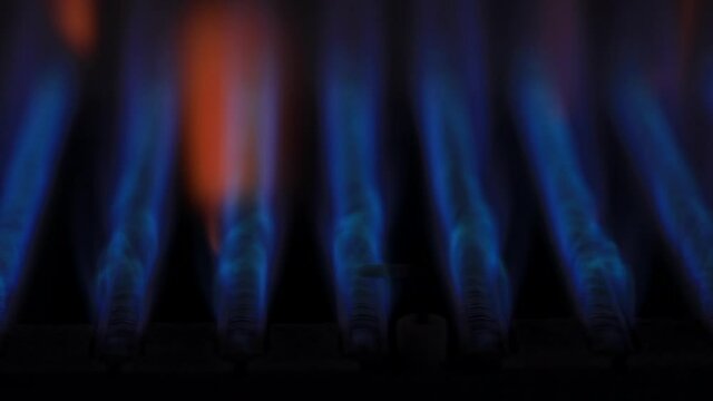 Ignition and burning of natural gas in water heater furnace