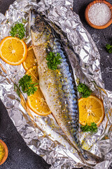 raw mackerel with spices in baking foil