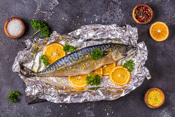 raw mackerel with spices in baking foil