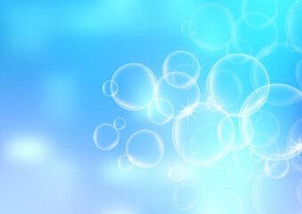 Abstract natural blue sky blurred light and bubbles background.