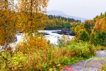 Bardufoss waterfall located in Tamok Valley, Troms og Finnmark region, Norway
