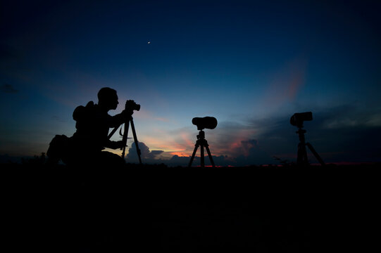 The photographer is taking pictures of the stars