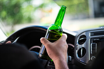 Man drinking beer while driving a car Don't drink and drive concept. transportation and vehicle...