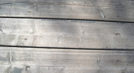 Obraz premium Grey wooden background with horizontal non-painted boards of burlywood color. Vintage style 