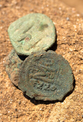 Byzantine copper coins from the reign of Emperor Justinian 1. Excavations of the winery in the ancient fortress of the 5th century in the town of Byala. Follis.
