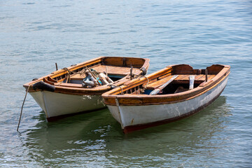 Naklejka na ściany i meble front viewe two fisher boat on sea