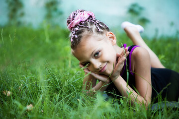 Girl smiling in the grass